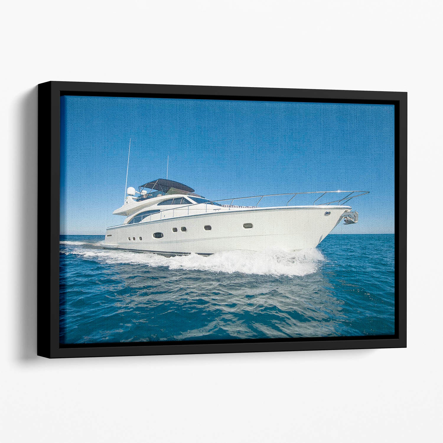 A luxury private motor yacht Floating Framed Canvas