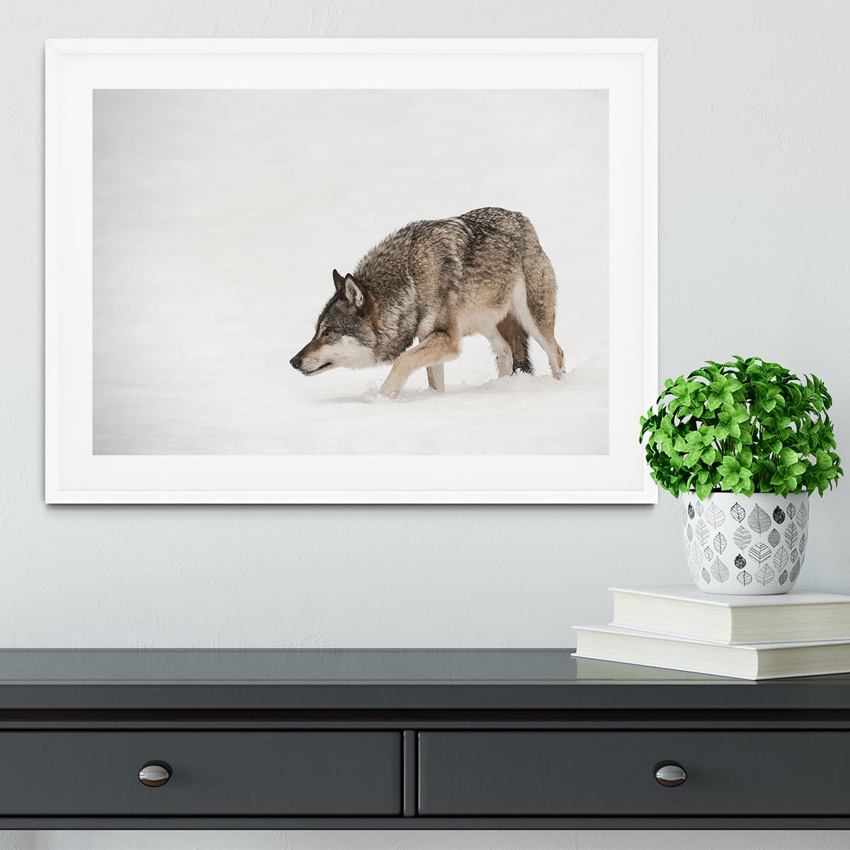 A solitary lone wolf prowls through snow Framed Print - Canvas Art Rocks - 5