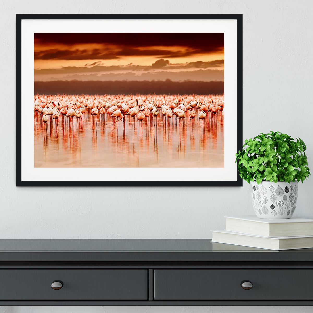 African flamingos in the lake over beautiful sunset Framed Print - Canvas Art Rocks - 1