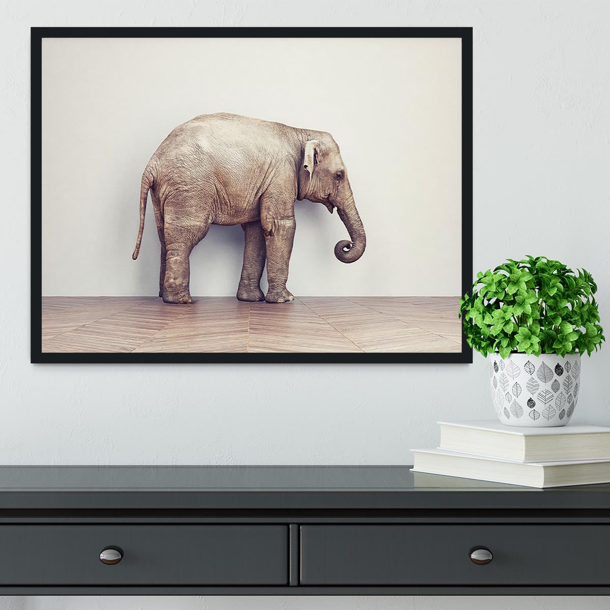 An elephant calm in the room near white wall. Creative concept Framed Print - Canvas Art Rocks - 2
