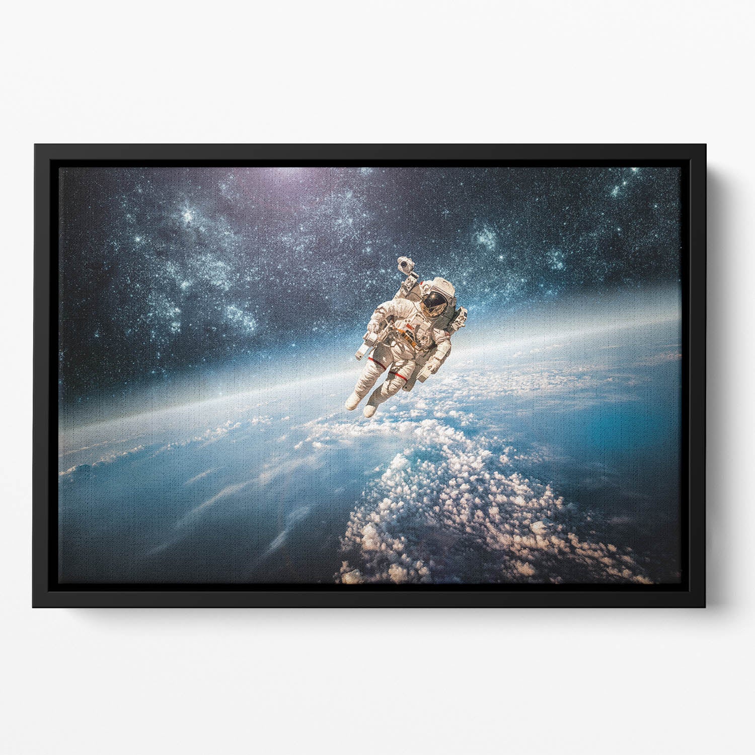 Astronaut in outer space planet earth Floating Framed Canvas