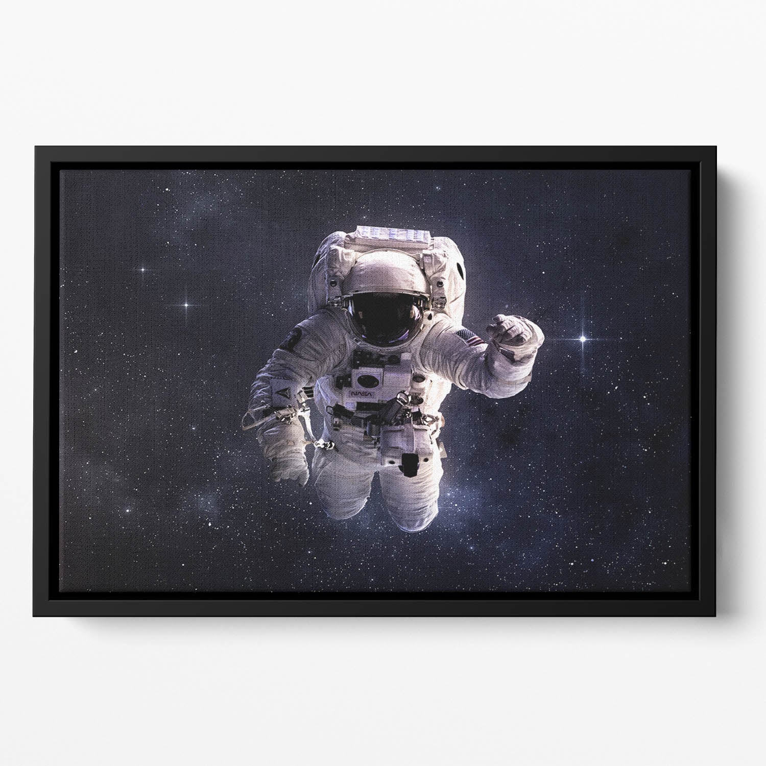 Astronaut in outer space with stars Floating Framed Canvas