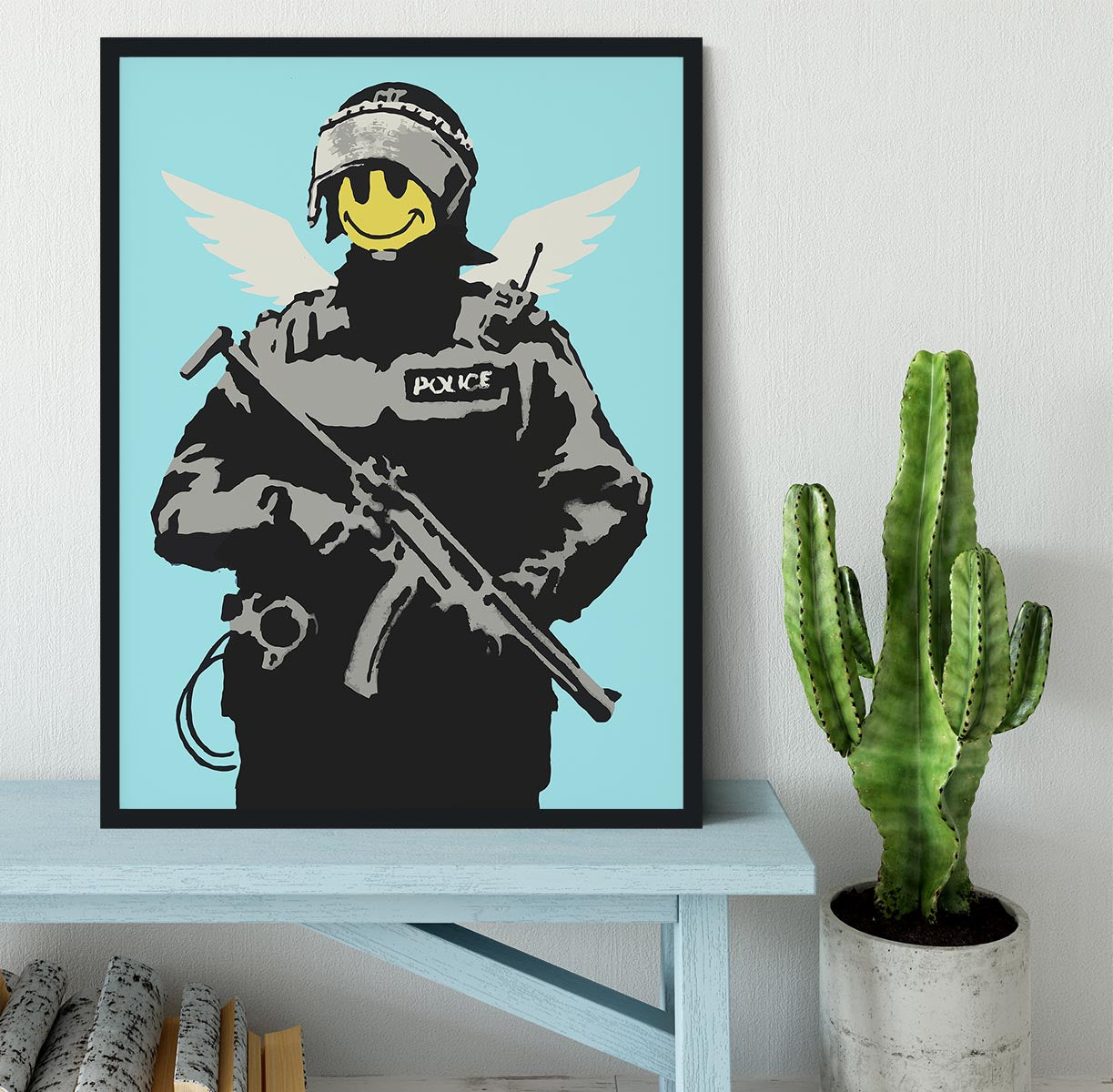 Banksy Smiley Angel Policeman Light Blue Framed Print - Canvas Art Rocks - 2
