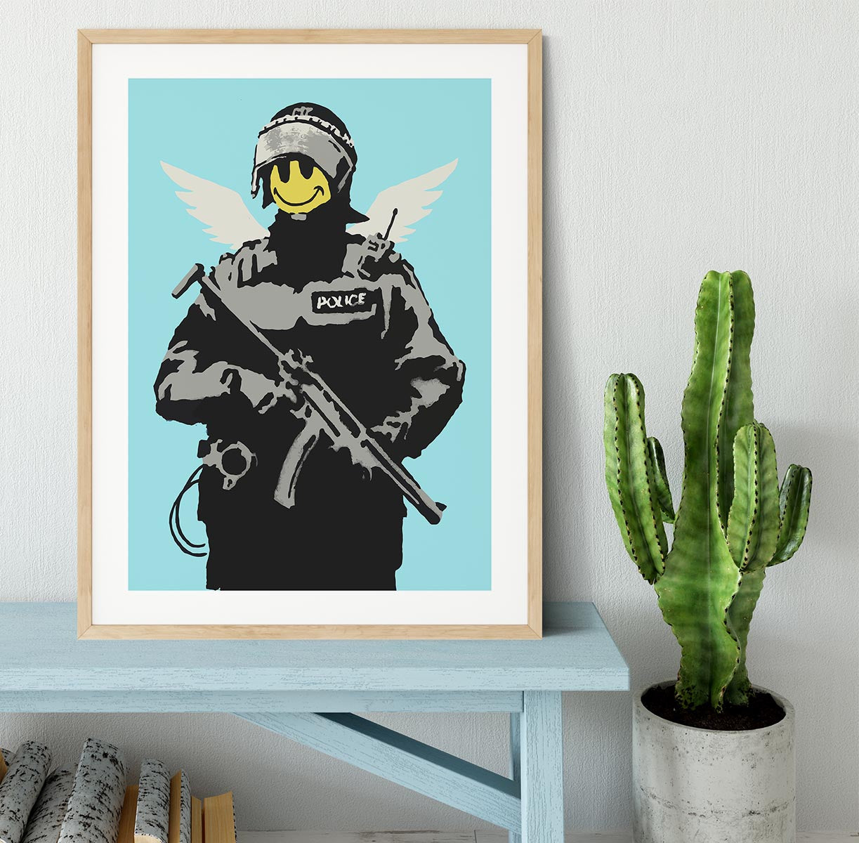 Banksy Smiley Angel Policeman Light Blue Framed Print - Canvas Art Rocks - 3
