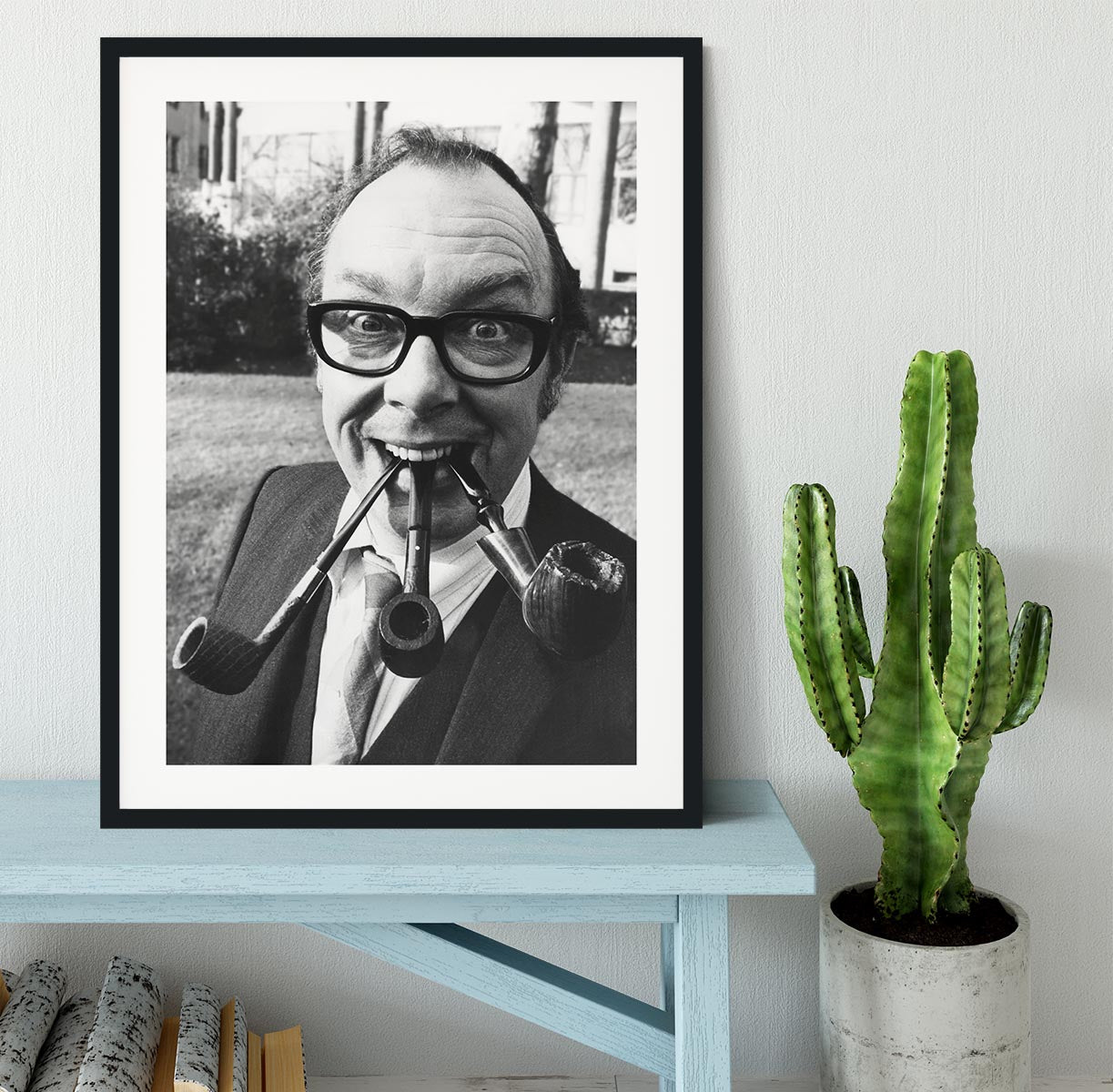 Eric Morecambe with three pipes in his mouth Framed Print - Canvas Art Rocks - 1