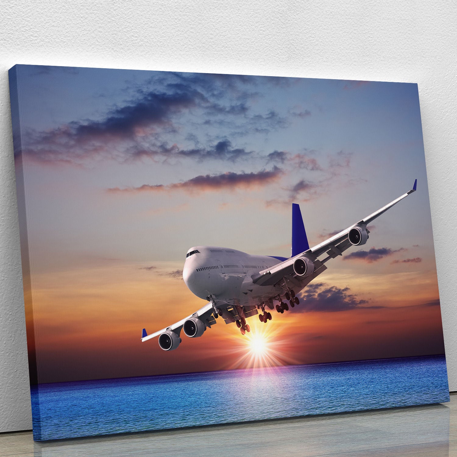 Jet liner over the sea at dusk Canvas Print or Poster - Canvas Art Rocks - 1