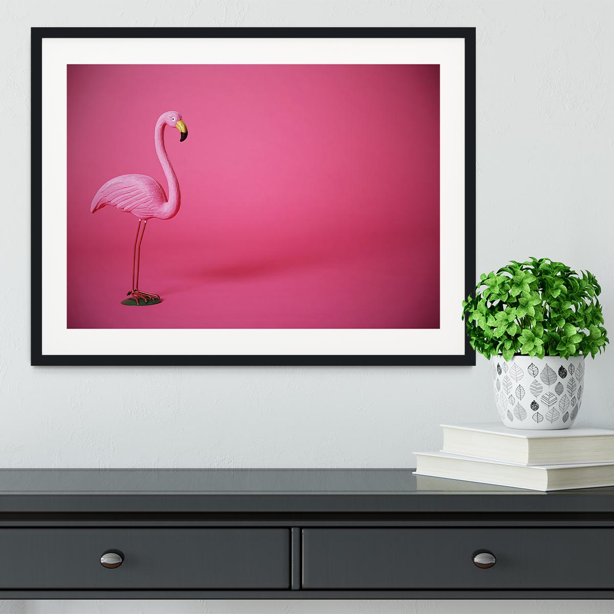Kitsch pink flamingo in studio Framed Print - Canvas Art Rocks - 1