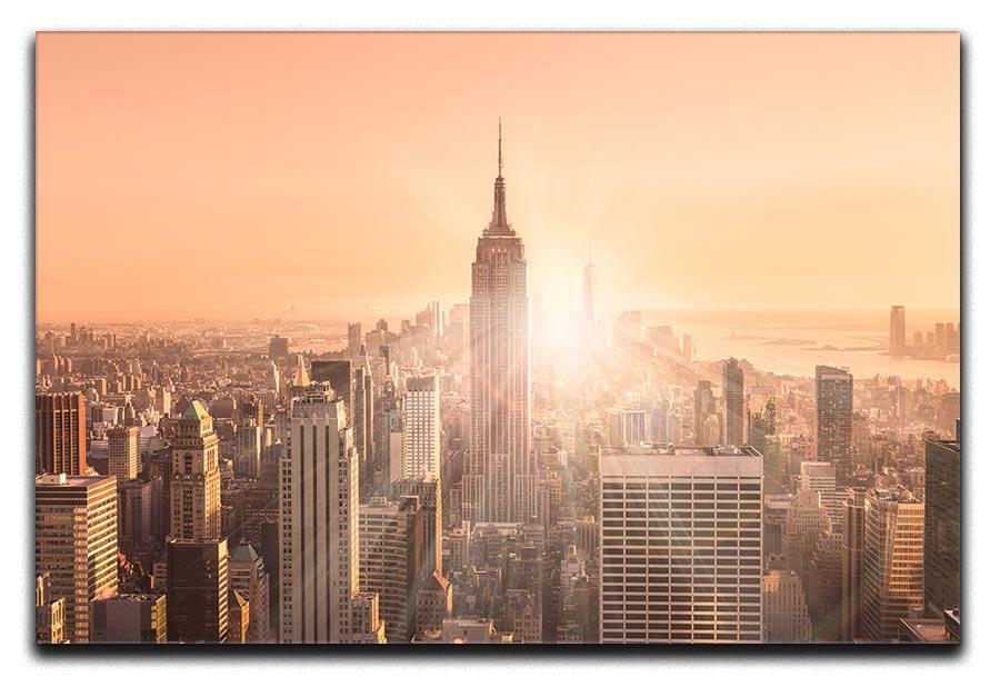 Manhattan downtown skyline with illuminated Empire State Building Canvas Print or Poster  - Canvas Art Rocks - 1