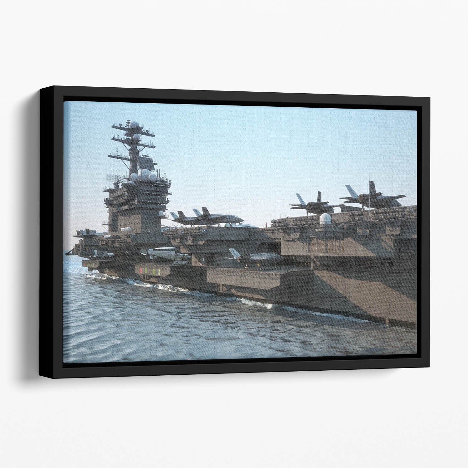 Navy aircraft carrier angled view Floating Framed Canvas