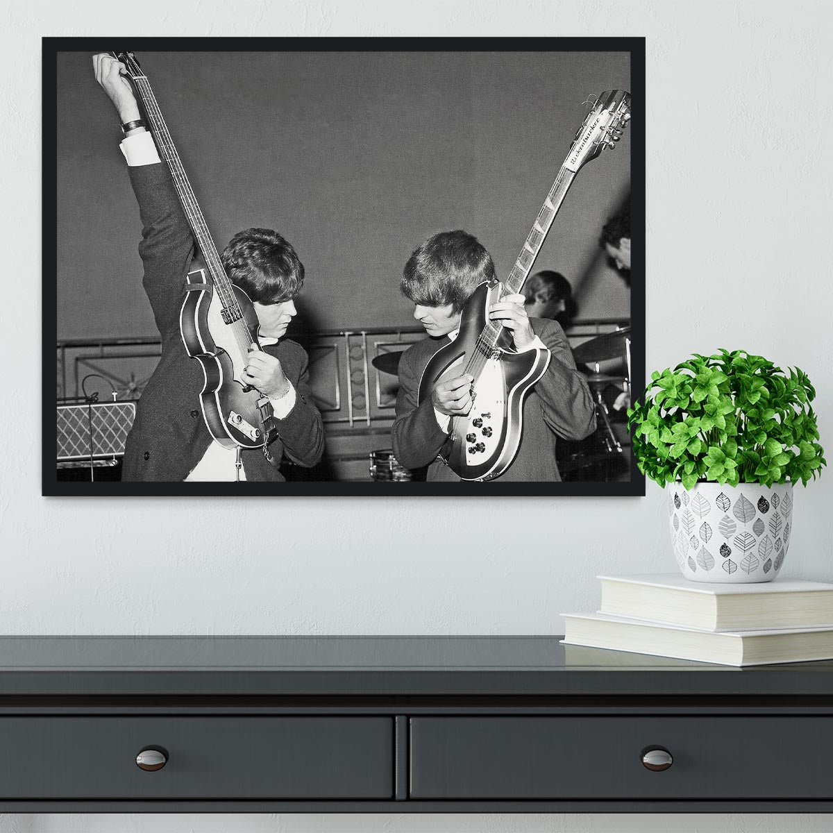 Paul McCartney and George Harrison tune their guitars Framed Print - Canvas Art Rocks - 2