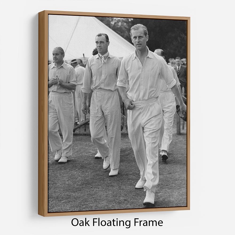 Prince Philip leading his cricket team onto the field Floating Frame Canvas