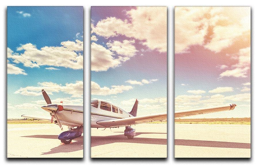 Propeller plane parked 3 Split Panel Canvas Print - Canvas Art Rocks - 1