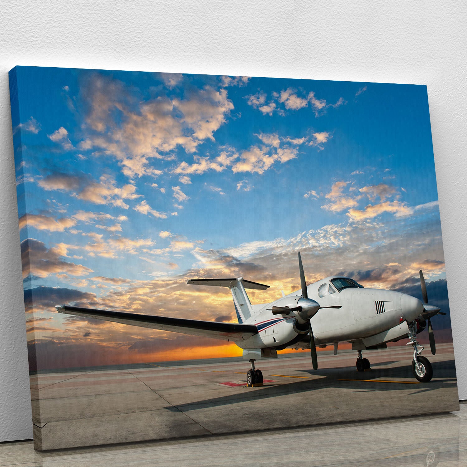 Propeller plane parking at the airport Canvas Print or Poster - Canvas Art Rocks - 1
