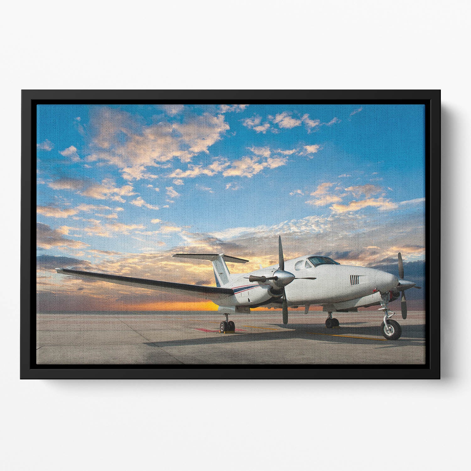 Propeller plane parking at the airport Floating Framed Canvas