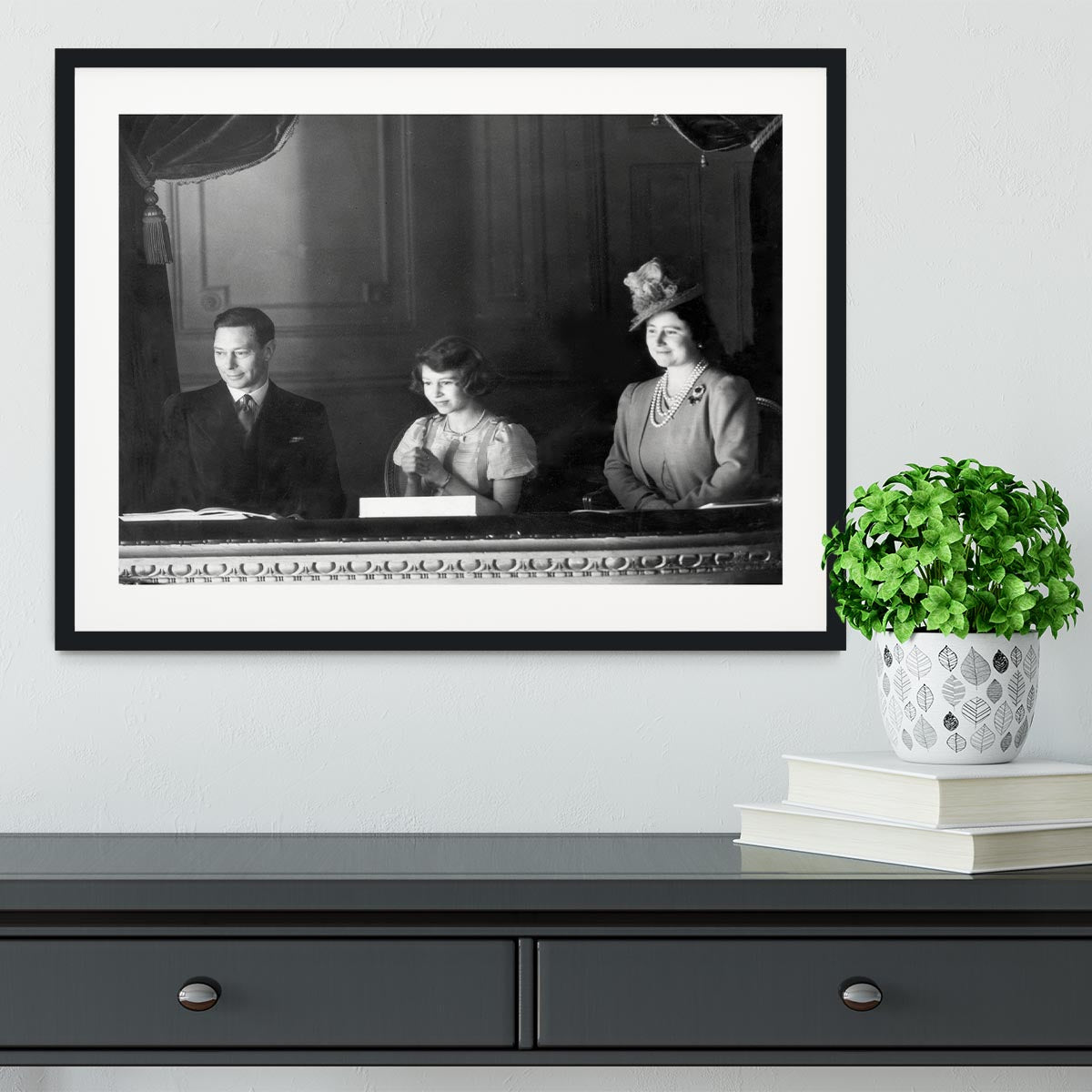 Queen Elizabeth II with her parents entranced viewing the stage Framed Print - Canvas Art Rocks - 1