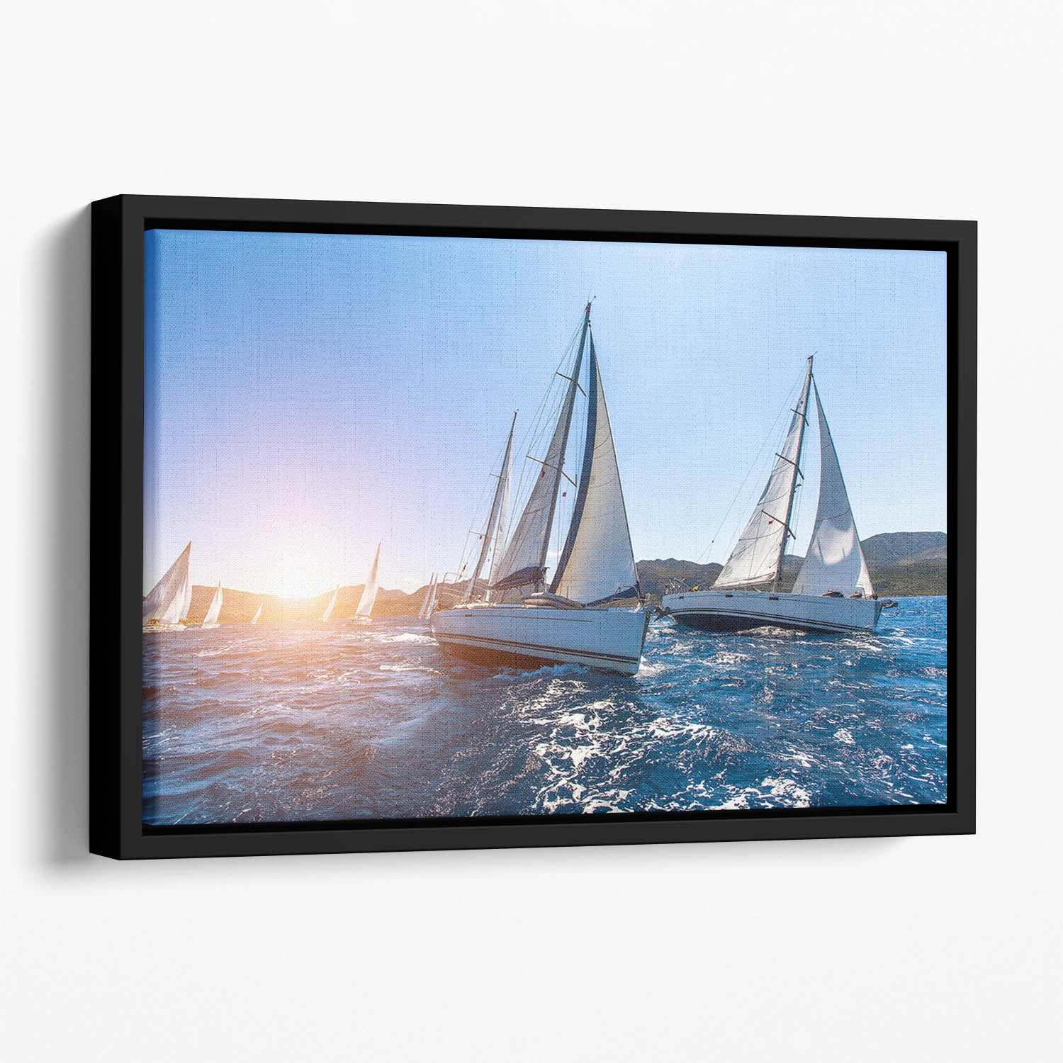 Sailing in the wind through the waves at the Sea Floating Framed Canvas