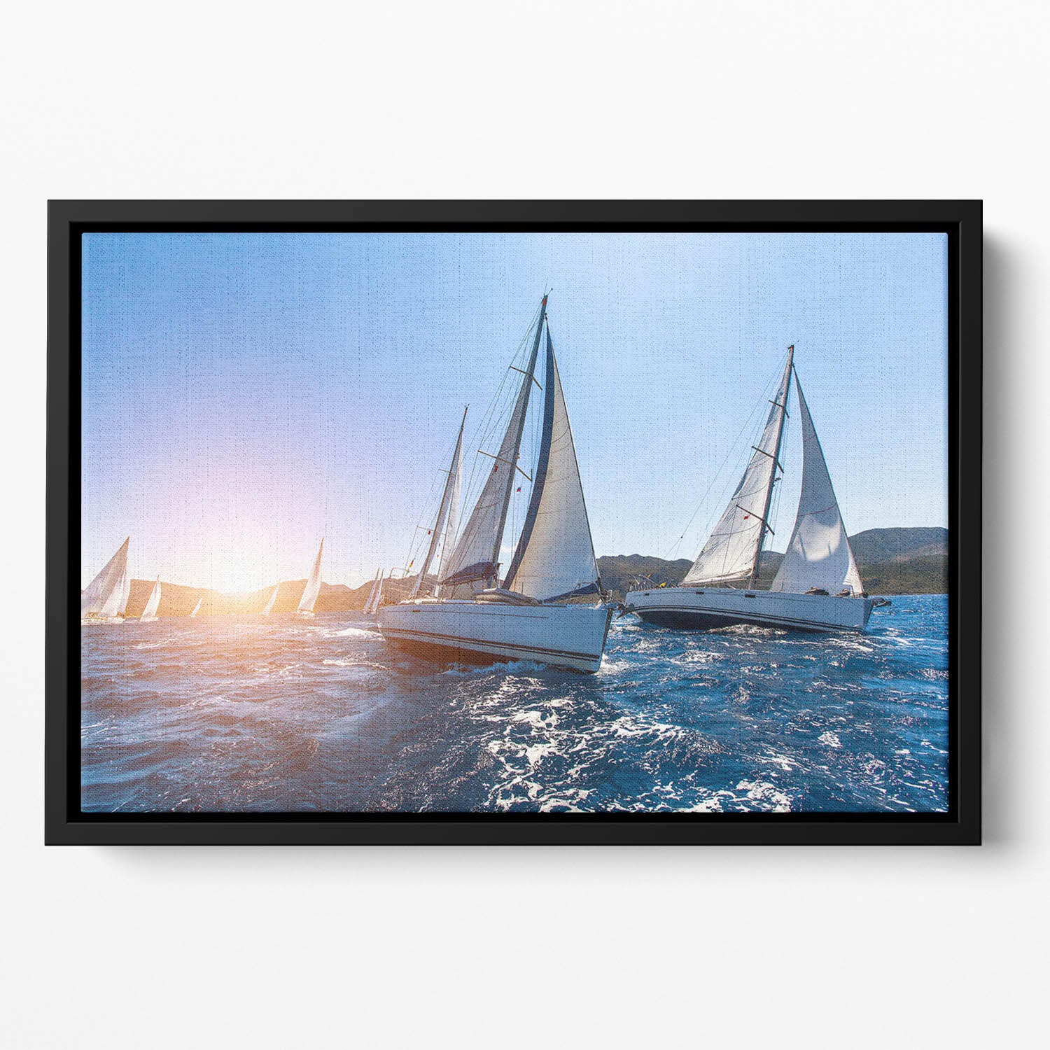 Sailing in the wind through the waves at the Sea Floating Framed Canvas