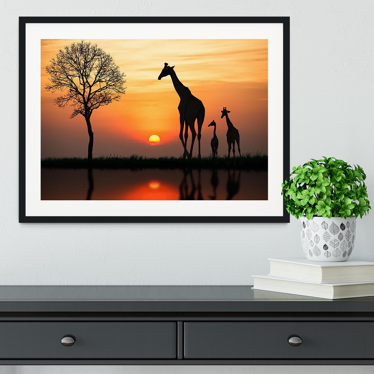 Silhouette of giraffe with reflection in water Framed Print - Canvas Art Rocks - 1
