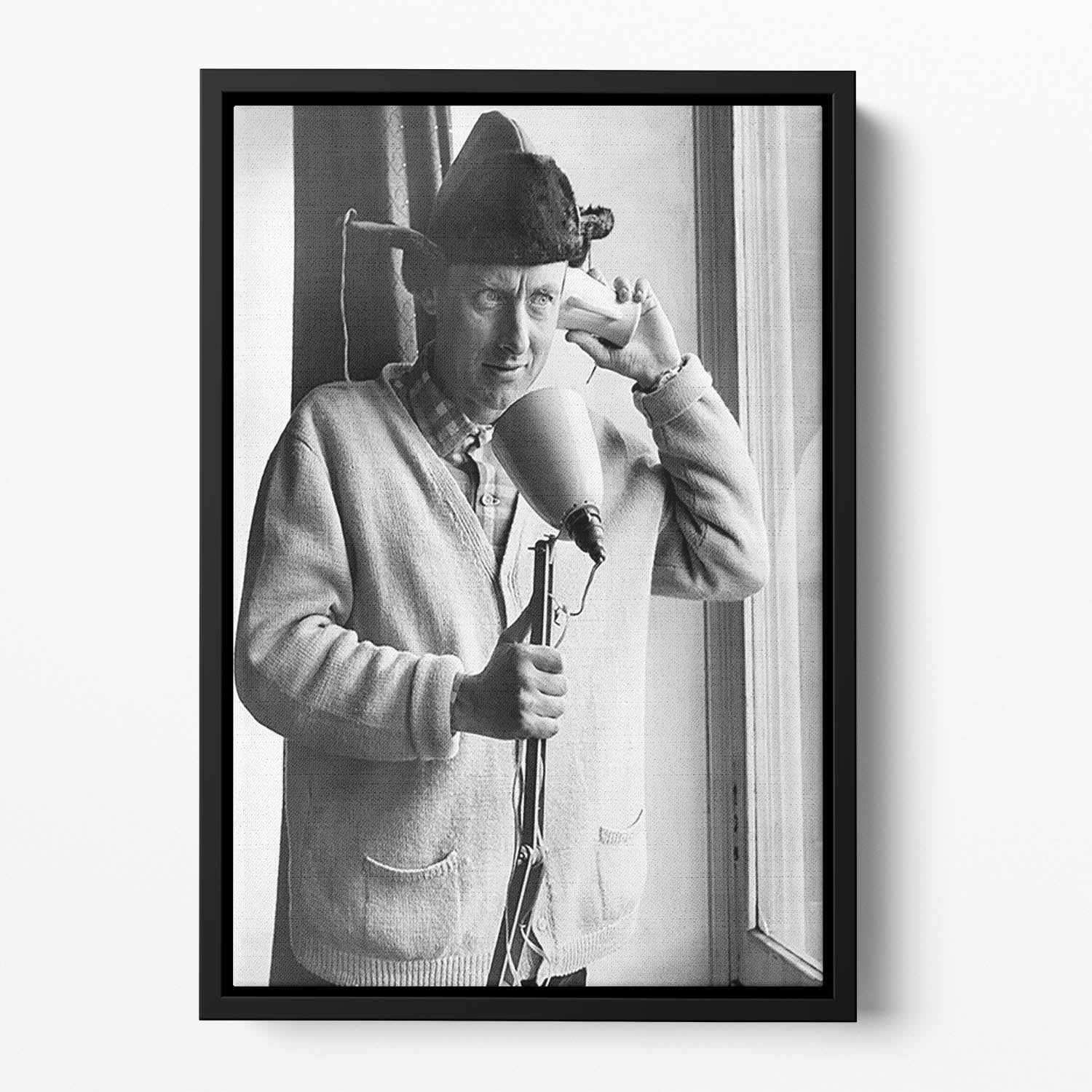 Spike Milligan makes a phone call Floating Framed Canvas