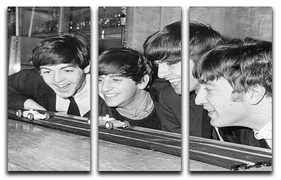 The Beatles play with toy racing cars 3 Split Panel Canvas Print - Canvas Art Rocks - 1