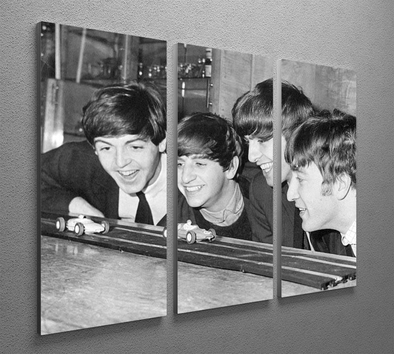 The Beatles play with toy racing cars 3 Split Panel Canvas Print - Canvas Art Rocks - 2