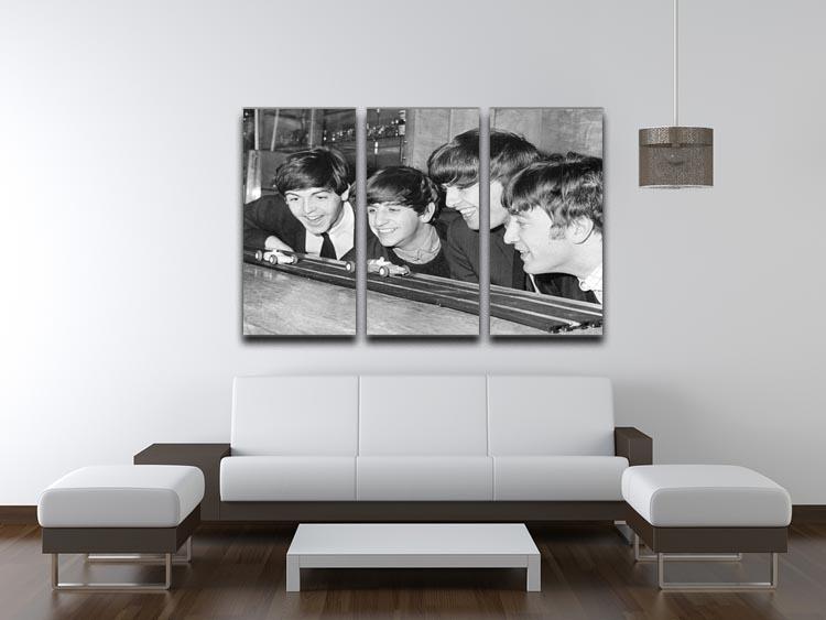 The Beatles play with toy racing cars 3 Split Panel Canvas Print - Canvas Art Rocks - 3