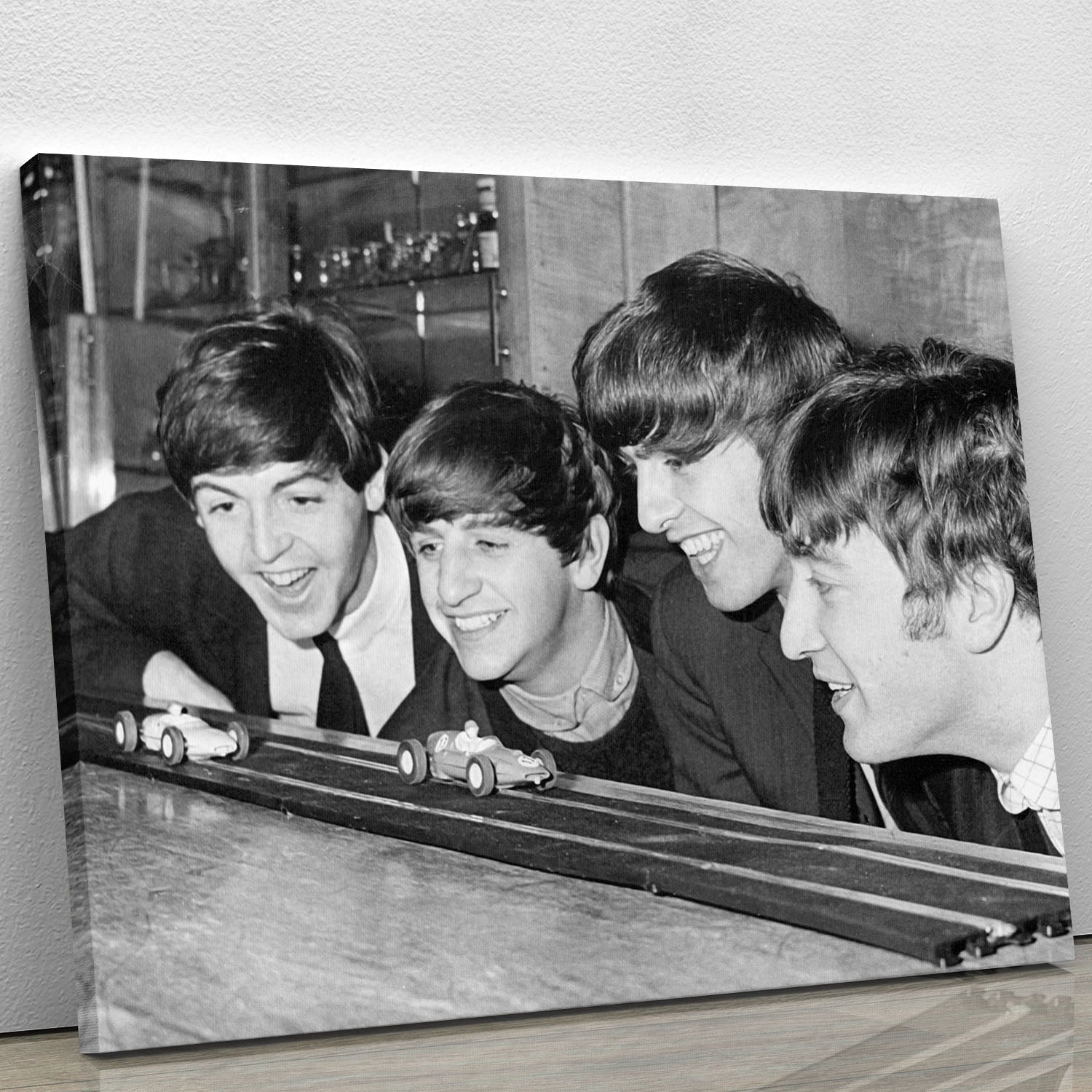 The Beatles play with toy racing cars Canvas Print or Poster - Canvas Art Rocks - 1