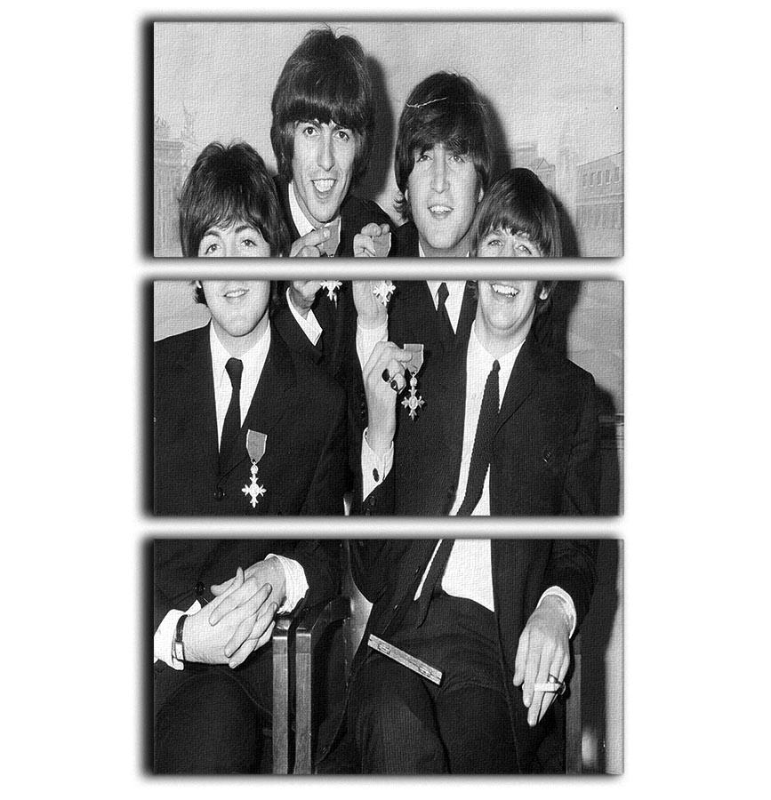 The Beatles sitting with their MBEs 3 Split Panel Canvas Print - Canvas Art Rocks - 1