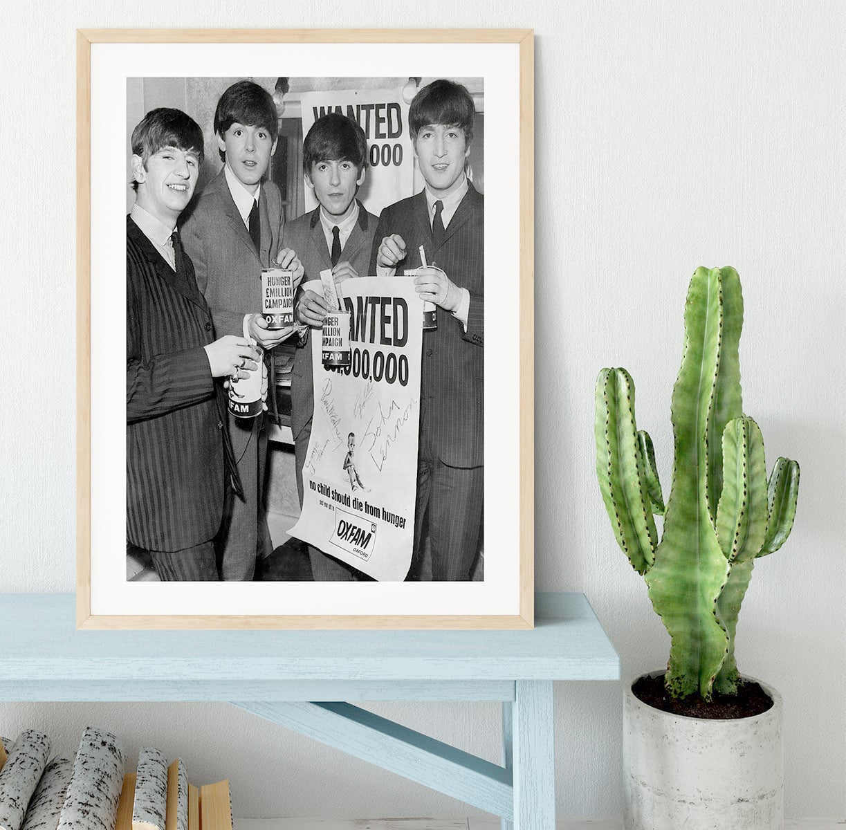 The Beatles with an Oxfam poster Framed Print - Canvas Art Rocks - 3