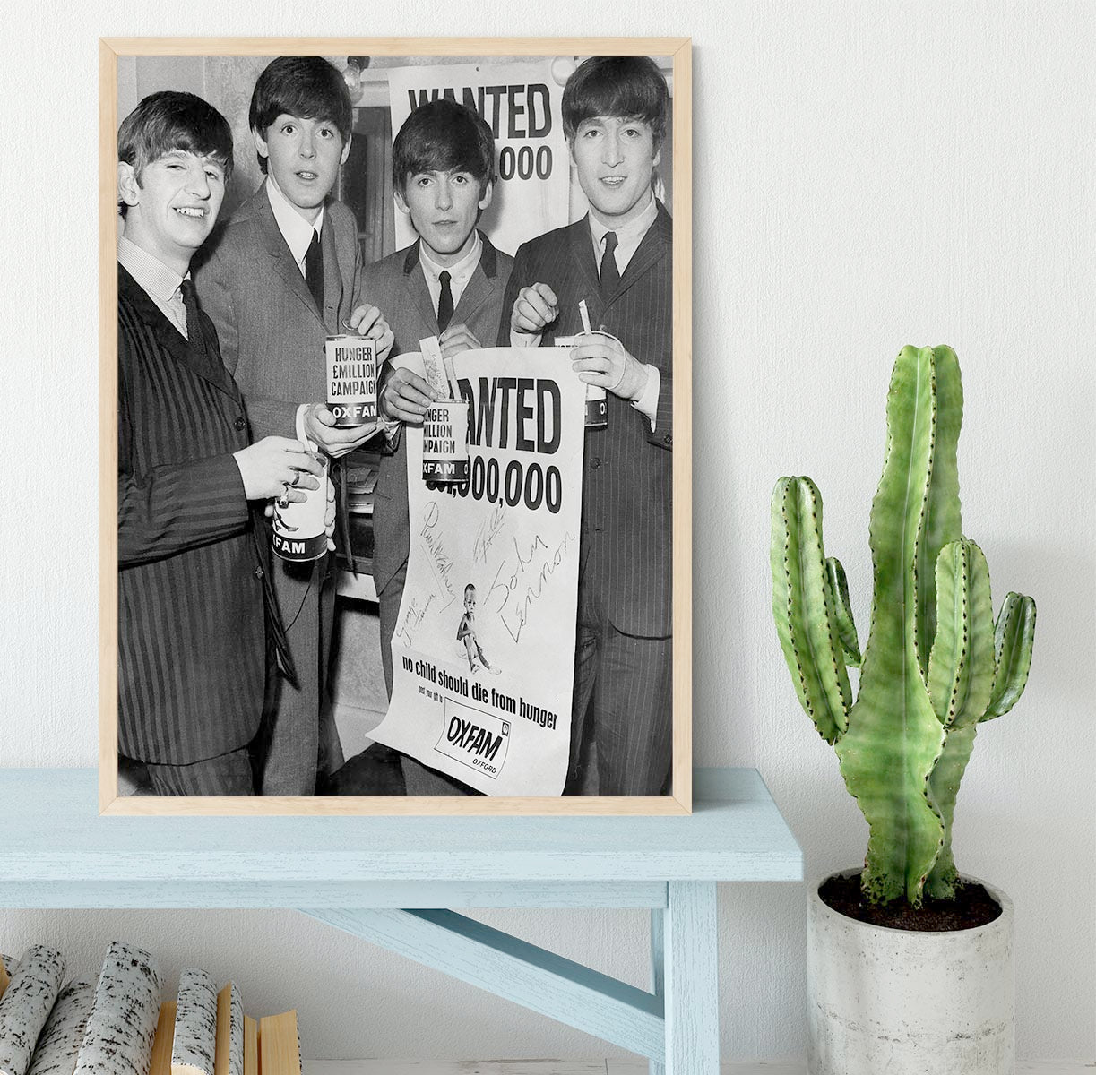 The Beatles with an Oxfam poster Framed Print - Canvas Art Rocks - 4